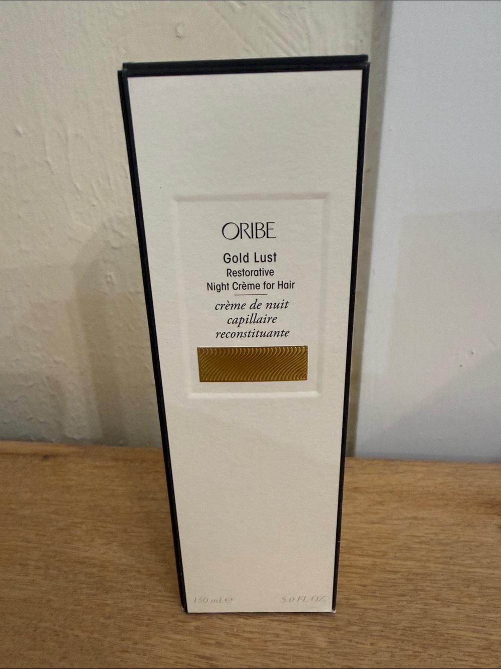 Oribe Gold Lust Night CrĂšme for Hair - White and Gold